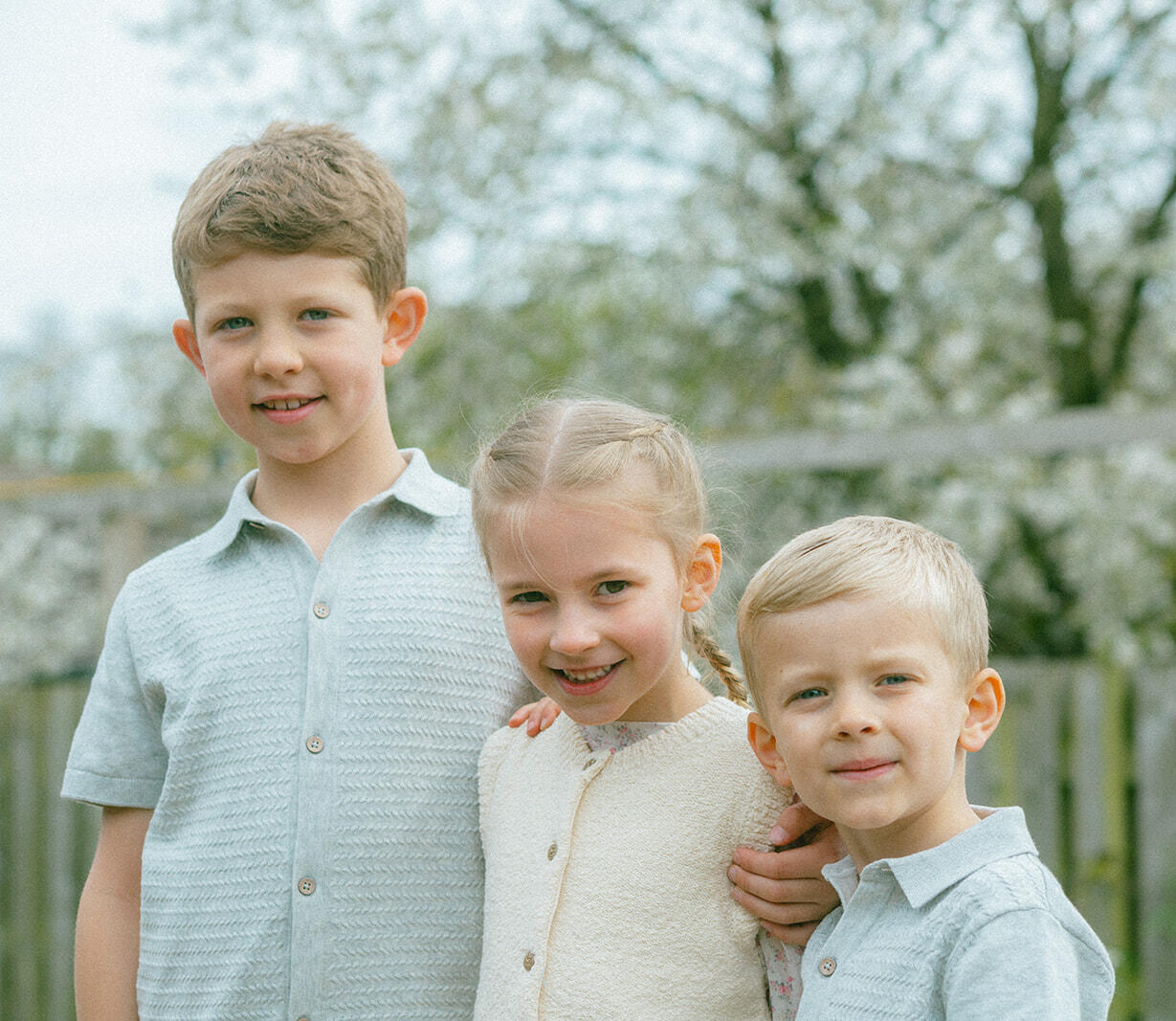 Happy Cousins A beautiful image of three cousins hugging at Bailand Lodge, Woodhall Spa, Lincolnshire.
