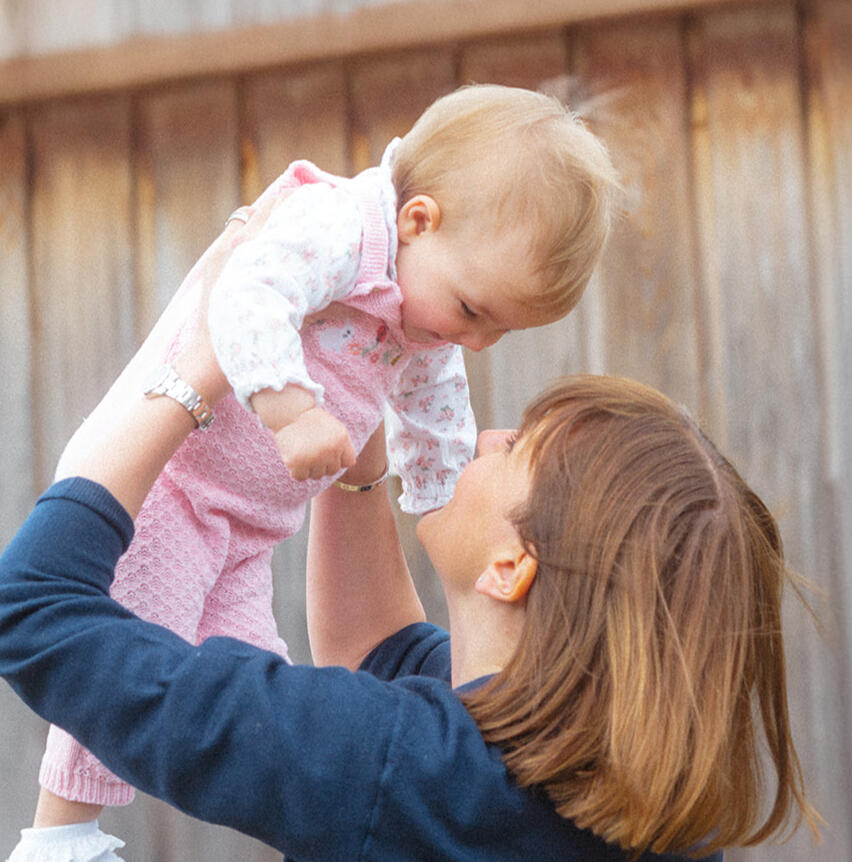Bainland Lodge Family Photography Beautiful picture of a mum playing with her baby girl at Bailand Lodge, Woodhall Spa, Lincolnshire